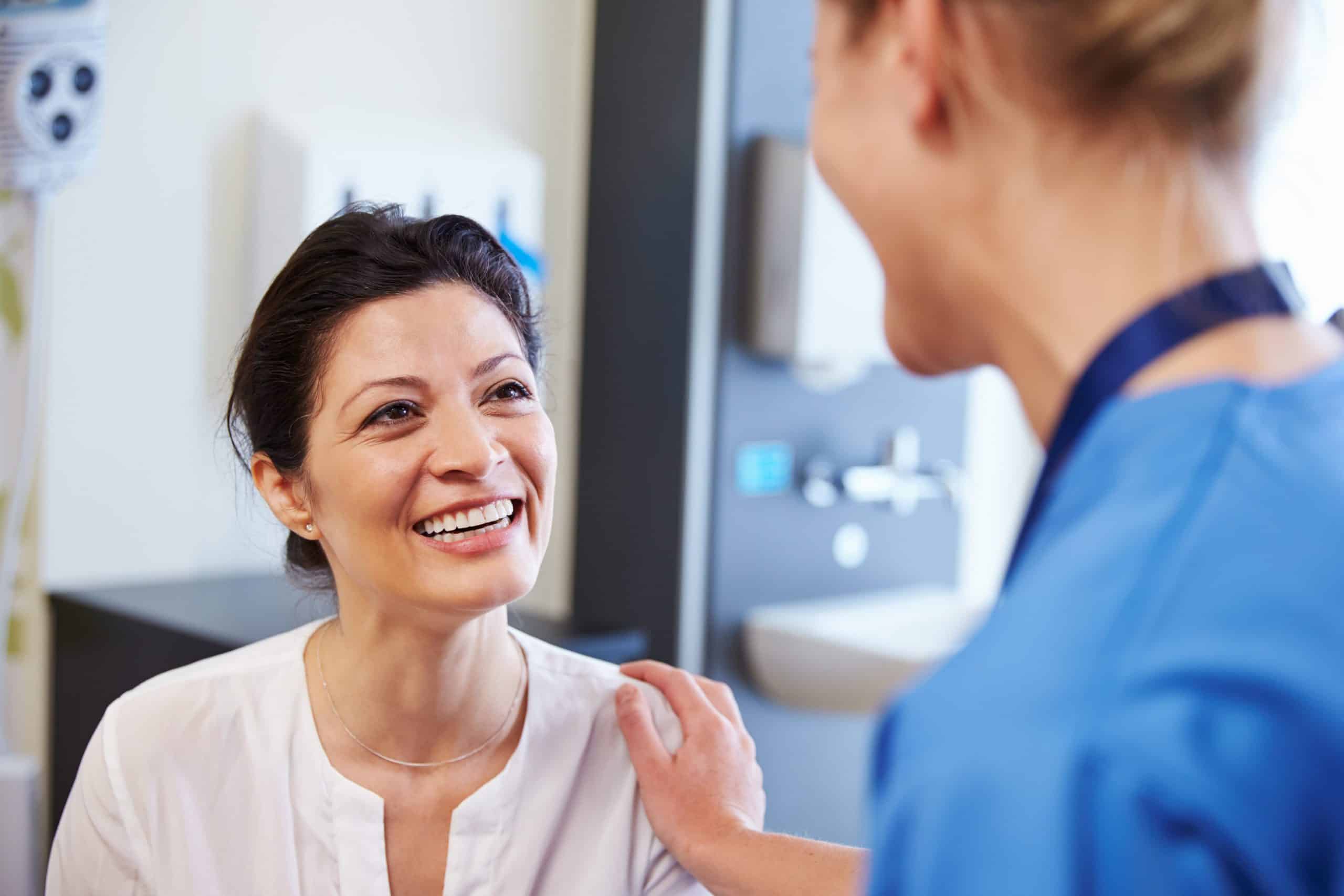 female patient and pain specialist nurse practitioner